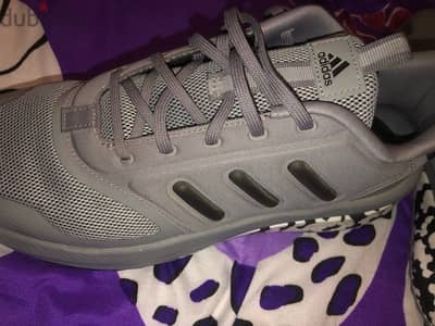 Adidas man waking and running shoes