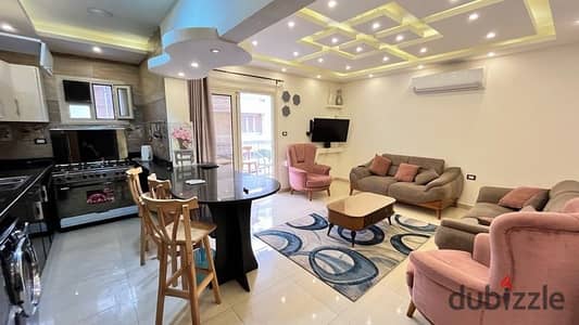 Apartment for rent in Al-Mamoura Beach, super lux, 3 air conditioners, and beach furniture