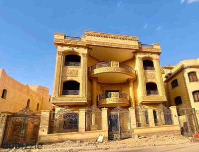 Villa for sale in South Academy in Al Tagamoa Al Khames on a garden