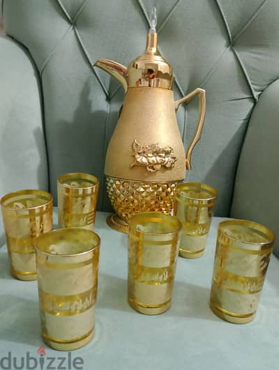 طقم كاسات مذهب عليه مع ترمس مزخرف ذهبي جديدنيش بسعر المستعمل بالزقازيق