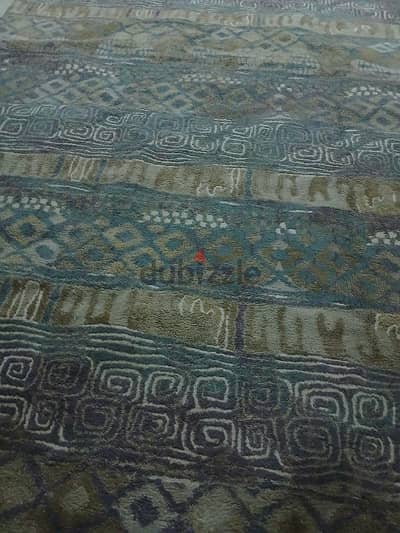 سجادة النساجون