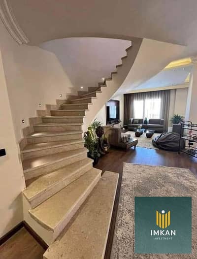 iVilla with a garden for sale in Mountain View 1.1 (Fifth Settlement, facing Al Rehab). The unit is fully finished, offers an immediate lagoon view, a