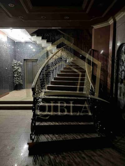 Building for sale in Mohandessin, luxurious residential and commercial in the heart of the Mohandessin area in Cairo