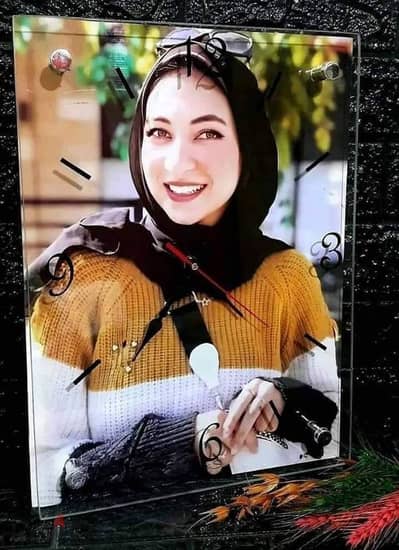 ساعه وبرواز ٢*١ بالصوره الشخصيه