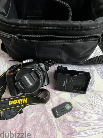 Nikon D3400 DSLR Camera + Bag