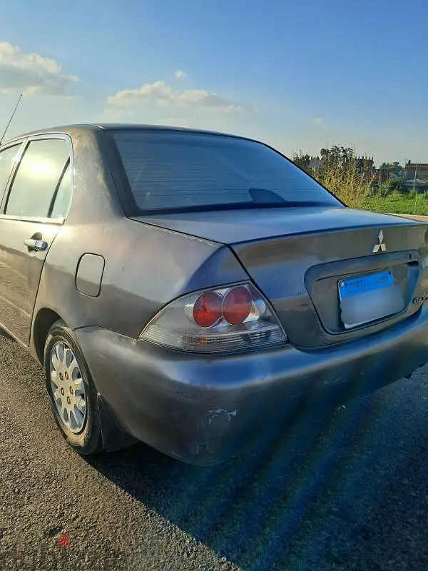 لانسر بومة ٢٠٠٦ خليجي اوتوماتيك - بومه حالة ممتازة63701719285377126