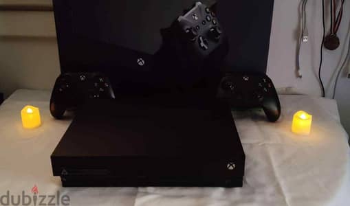 Xbox One X + Games – Excellent Condition, Ready to Play”