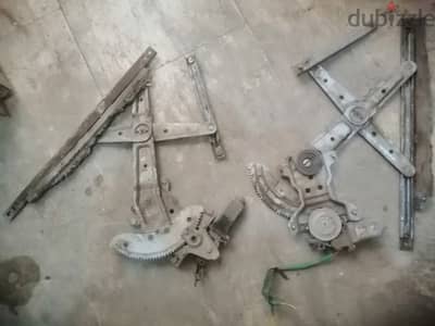 ٢ ماكينه رفع زجاج كهرباء بحاله كويسه
