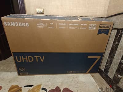 Samsung  58 inch tv UHD smart and receiver built-in