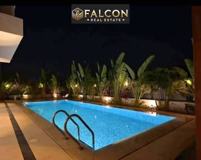 Villa for sale with an open landscape view in a luxury compound directly on the Suez Road