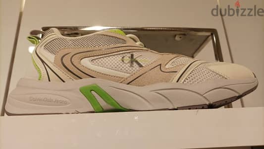 shoes Calvin Klein original 42  with box بها قطع خفيف من الشبك