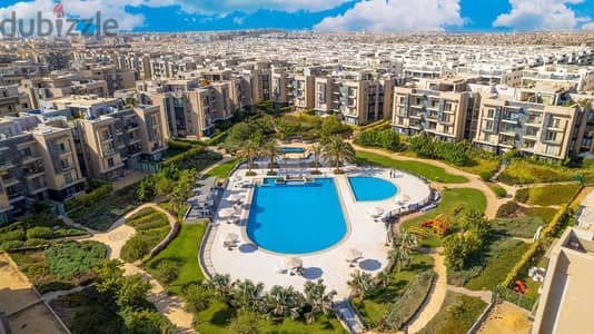 شقه للبيع بحديقه فى كمبوند جاليريا موون فالى 2 غرف نوم