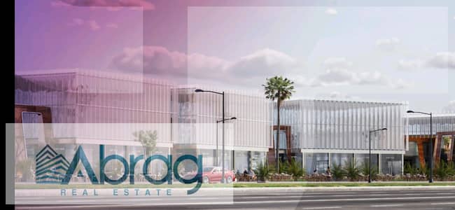 For sale, a shop with a facade on Dahshur Street in Sheikh Zayed, next to the Mall, with a 10% down payment and installments up to 7 years