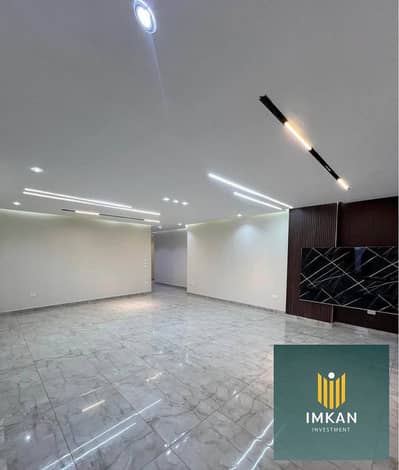 Apartment for sale with installments over 10 years in a compound in front of Al Rehab