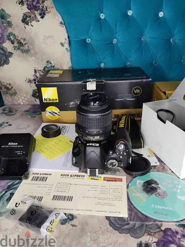 كاميرا نيكون D5100 كسر زيرو64960082131843125