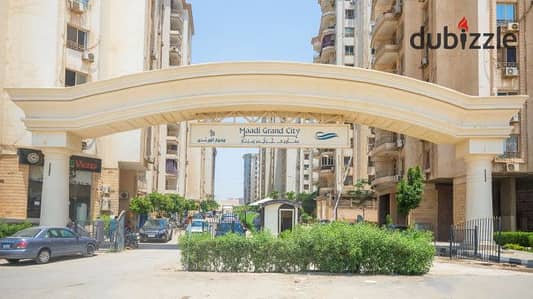 For sale, an apartment of 145m in Grand City Compound, Al-Morshedy, a prime location steps away from Carrefour Maadi.