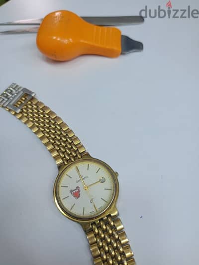ساعة اصلي Grovana SWISS MADE مذهب كوارتز هدية من أمير بحاله ممتازه