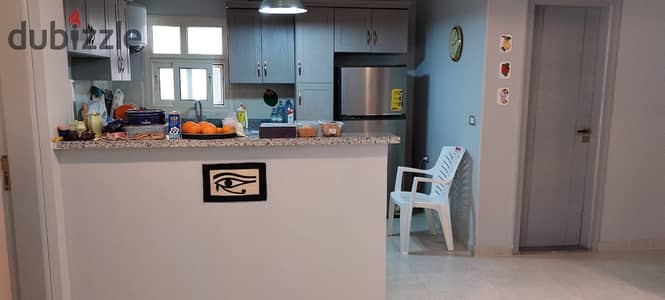 apartment with garden for rent in the square compound with Kitchen with ac's with appliances