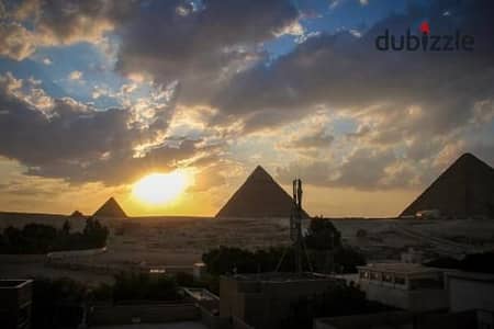 An investment opportunity in October at Pyramids Wells View Compound in Al-Azizia: own a 27 sqm studio for sale with installment plans