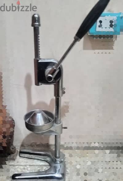 عصاره يدوي برتقال و رومان