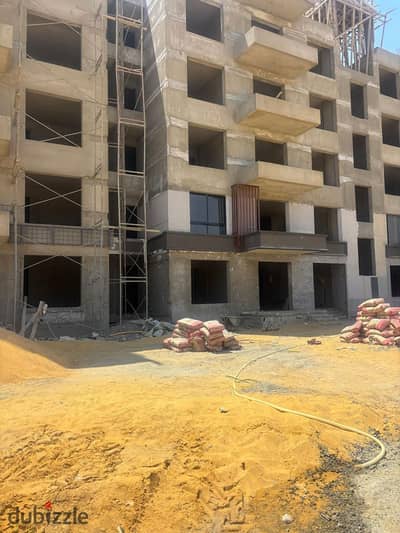 Prime Location – Fully Finished Building – For Sale In front of Sphinx Airport With installments over 12 years