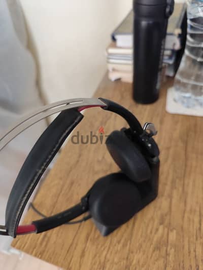 Plantronics voyager UC headphones with charging dock