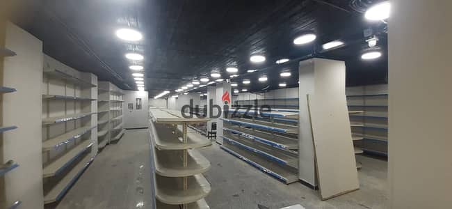 Supermarket for rent in Al-Hodaiq Al-Ahram 350 m furnished and finished 100 thousand