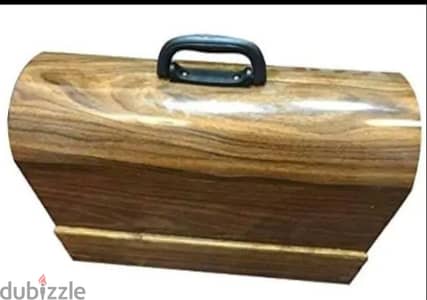 الصندوق الخشبي لآلة الخياطة المنزلية هو جهاز يستخدم لتخزين
