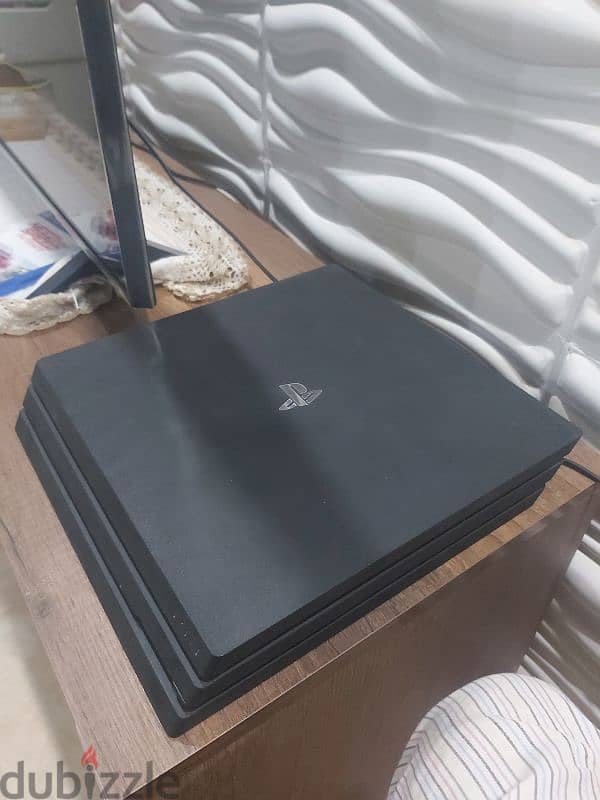Ps4 Pro 1 TB With controller and games 2
