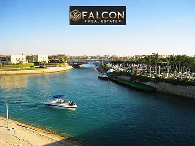 For sale, a fully finished chalet in Lisan Al-Wuzara, overlooking the marina directly on the North Coast