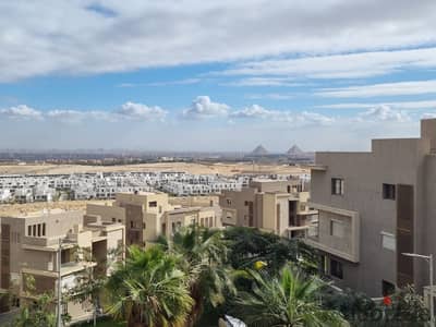 An Apartment finished with air conditioning in the most important location linking Cairo and Giza - Overlooking The Pyramids