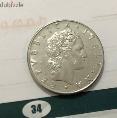 An Italian coin of 50 lira (L. 50) from the year 1976