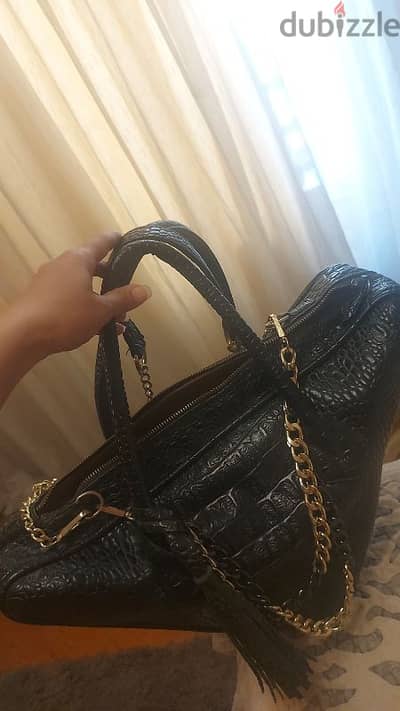شنطة جلد سوداء طبيعي