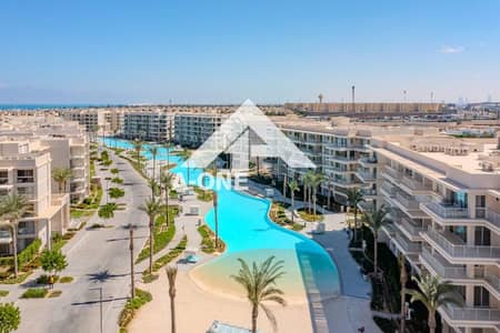 شاليه بإطلالة بانورامية على اللاجون في أول صف من المارينا بسعر مميز واقل من الماركيت في Marina marassi الساحل الشمالي north coast  سيدي عبد الرحمن