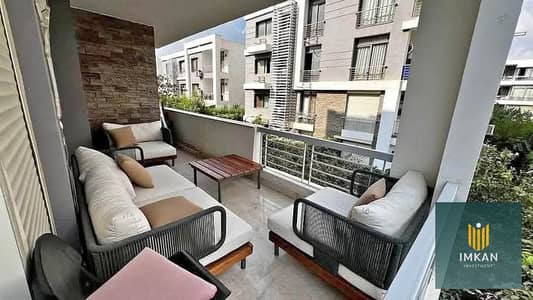 Apartment for sale for investment, 48% discount, 10-year installment plan, next to City Centre Almaza in Taj City compound, currently occupied in the