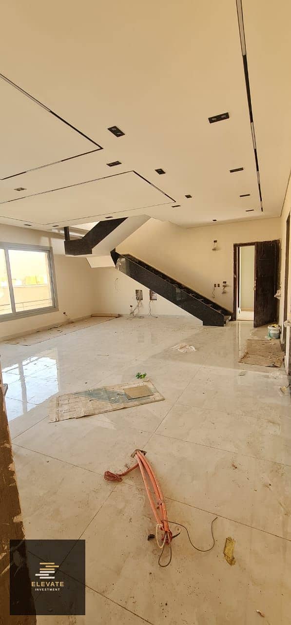 View of Penthouse roof for rent in Village Gate, kitchen, and air conditioning, Fifth Settlement ...