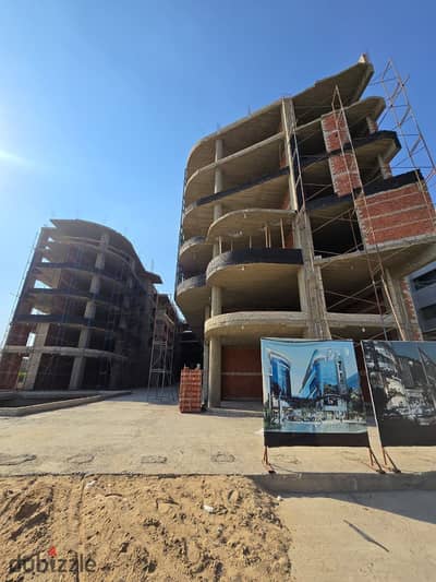 Office or clinic for sale, 66 sqm, in One O One Mall, Sheikh Zayed , installments available, delivery within 1 year