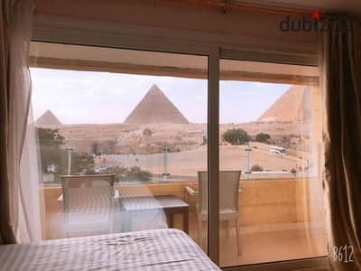In front of the Egyptian Museum, the last rooftop apartment with a stunning view is for sale, ready for immediate viewing, and currently rented out in