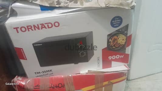 ميكرويف تونيدو ٩٠٠ وات جديد لم يستعمل ولا حتي للتجربه