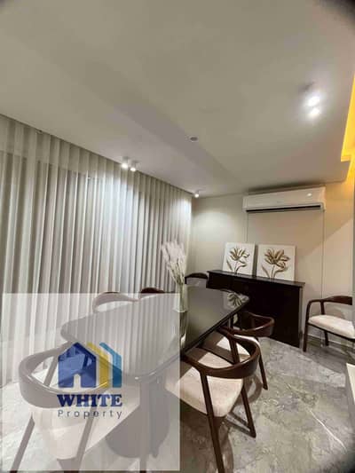 Furnished apartment for rent with hotel furnishings near Batal Ahmed Abdel Aziz, Mohandessin