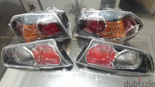 قطع غيار لانسر شارك