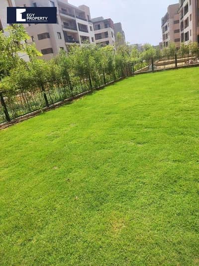 Apartment with a Private Garden for Sale in District 5 - New Cairo