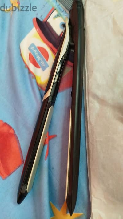 Babyliss ST393Eمكواة شعر