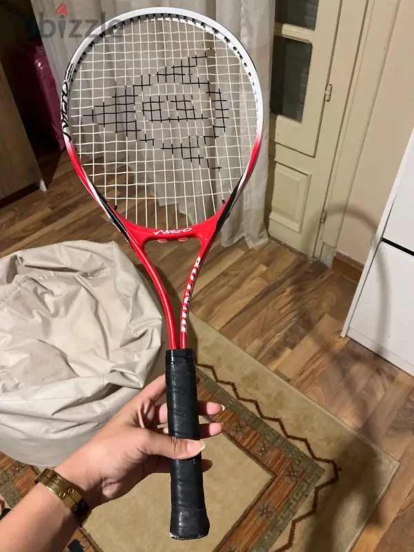 tennis racket مدرب تنس