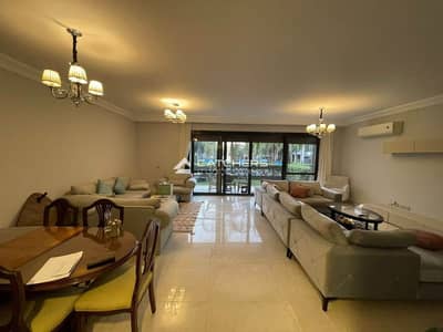 Own now an apartment with two views overlooking the landscape and pool in a strategic location in New Cairo's Fifth Settlement, Al Patio 7 compound by