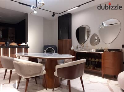 Furnished hotel-style apartment for rent directly opposite Mivida Compound in the Andalus area, minutes from the American University.