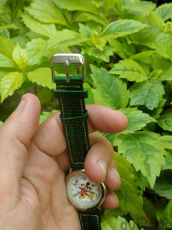 Disney watch, new with box 6