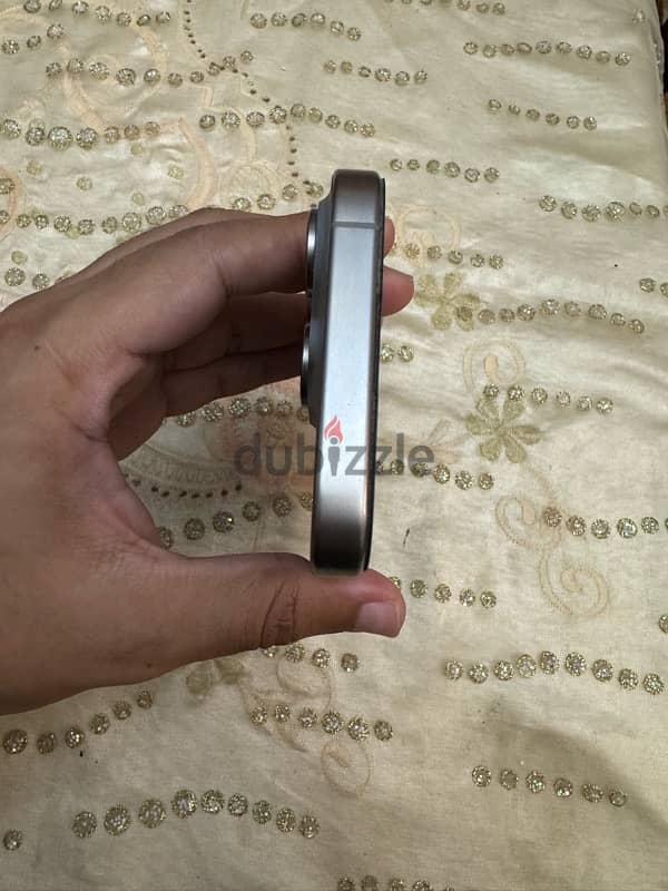 iPhone 15 pro natural titanium 5