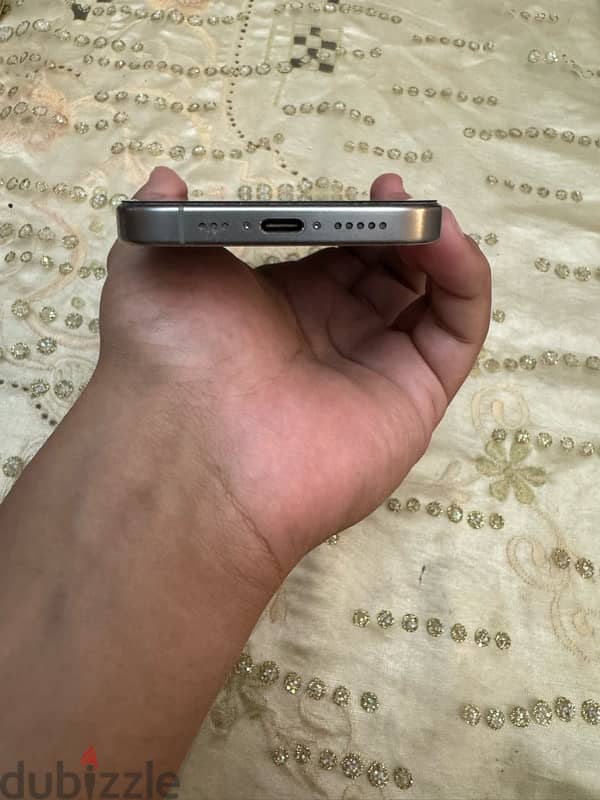 iPhone 15 pro natural titanium 6