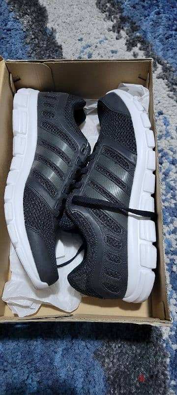 Adidas running shoes with box